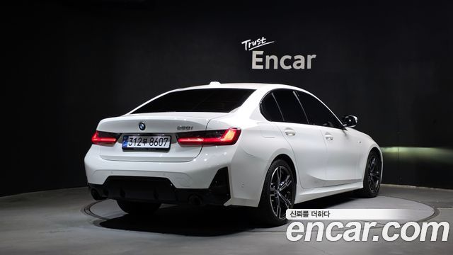 BMW 3-Series 2023 — photo 2
