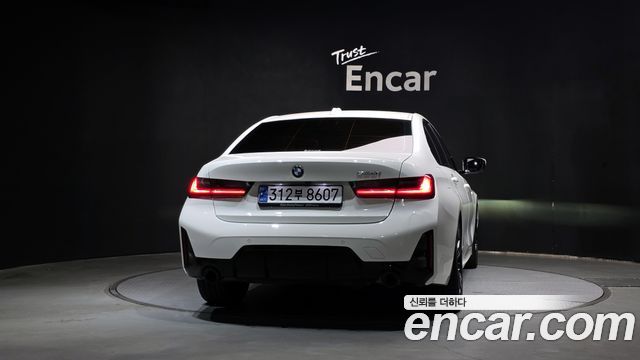 BMW 3-Series 2023 — photo 4