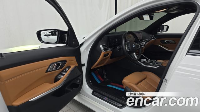 BMW 3-Series 2024 — photo 13