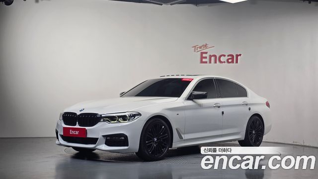 BMW 5-Series 2018 — photo 35