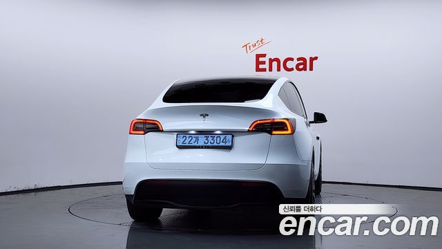 Tesla Model Y 2024 — photo 4