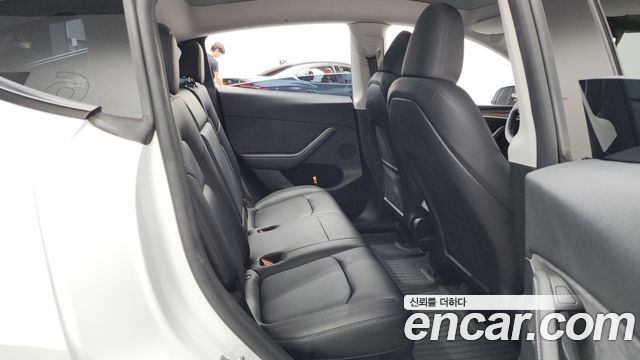 Tesla Model Y 2024 — photo 17