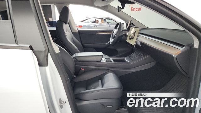 Tesla Model Y 2024 — photo 16