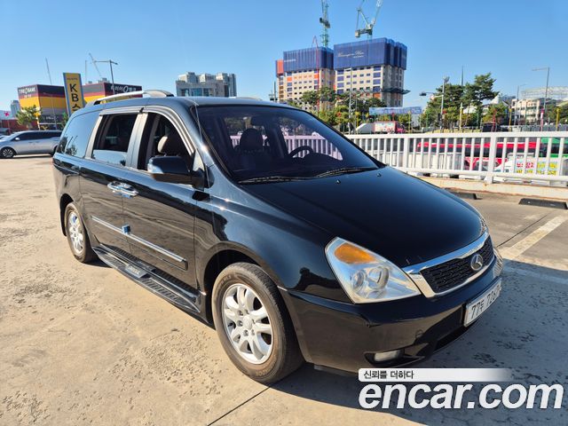 Kia Canival 2013 — photo 1