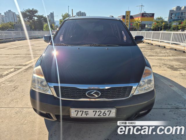 Kia Canival 2013 — photo 2