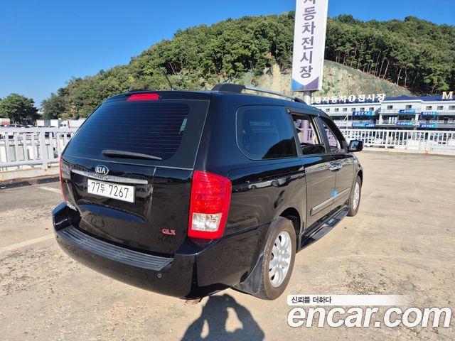 Kia Canival 2013 — photo 4