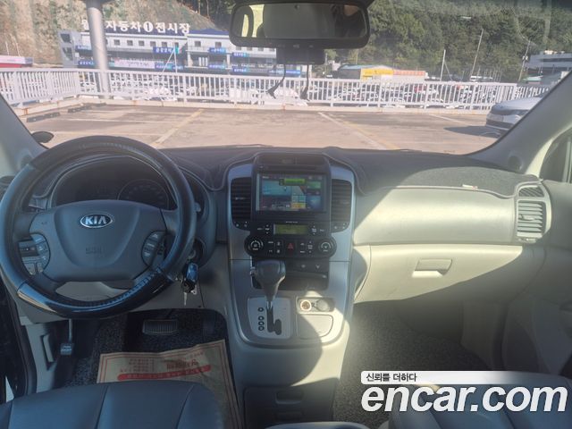 Kia Canival 2013 — photo 8