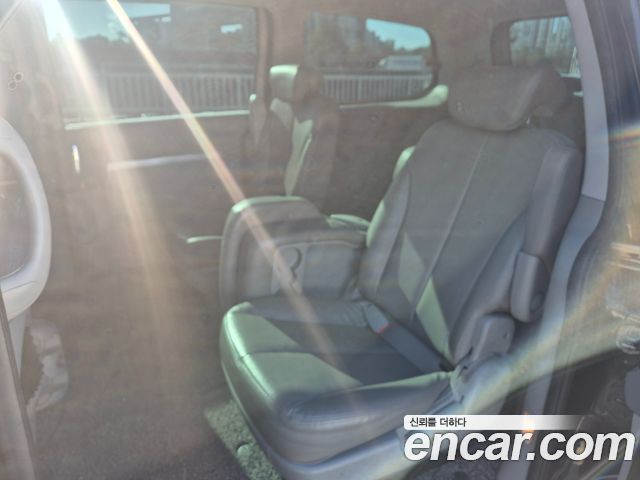 Kia Canival 2013 — photo 11