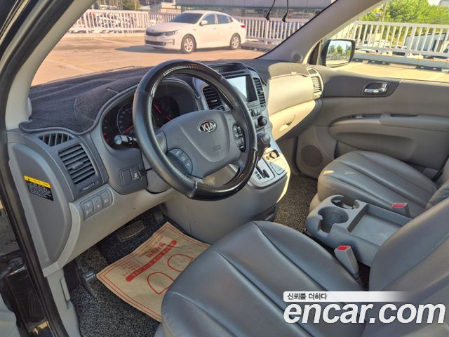 Kia Canival 2013 — photo 12