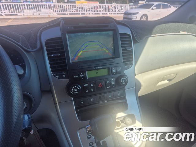 Kia Canival 2013 — photo 13