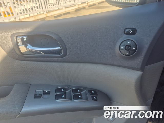 Kia Canival 2013 — photo 15