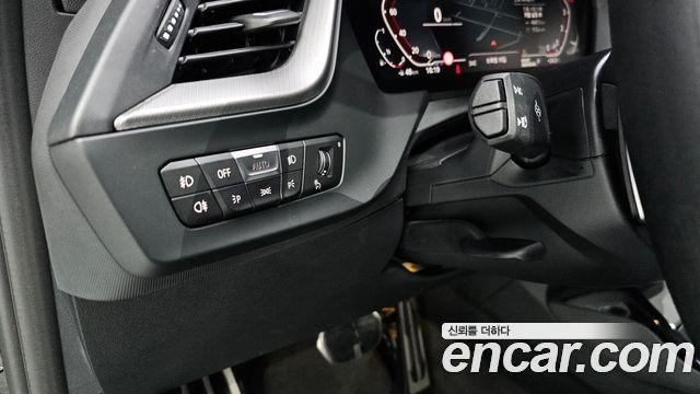 BMW 1-Series 2023 — photo 22
