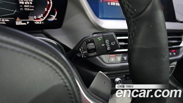 BMW 1-Series 2023 — photo 24