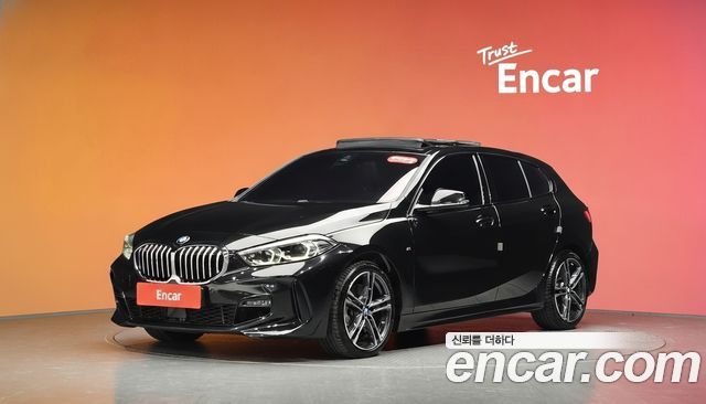 BMW 1-Series 2023 — photo 1