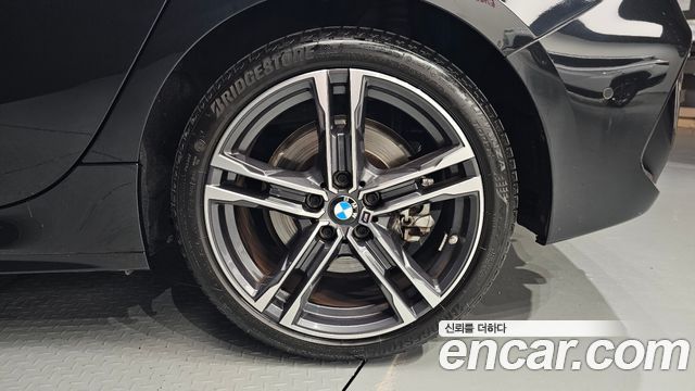 BMW 1-Series 2023 — photo 7