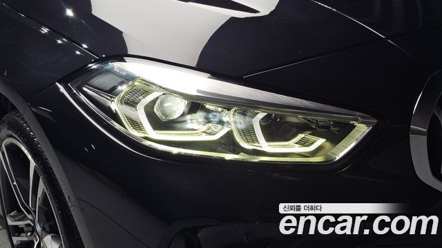 BMW 1-Series 2023 — photo 8