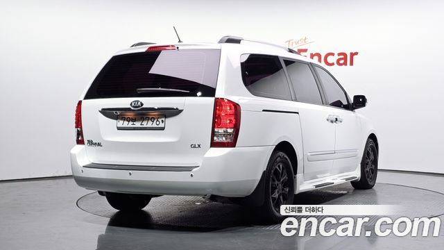 Kia Canival 2013 — photo 2