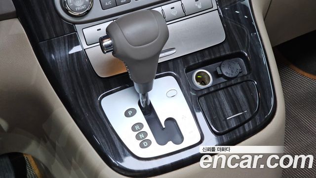 Kia Canival 2013 — photo 12