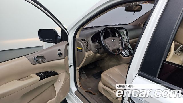 Kia Canival 2013 — photo 13