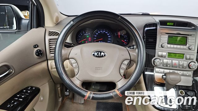 Kia Canival 2013 — photo 18