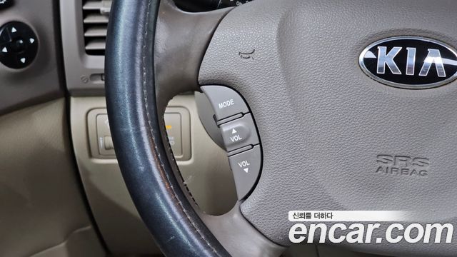 Kia Canival 2013 — photo 19