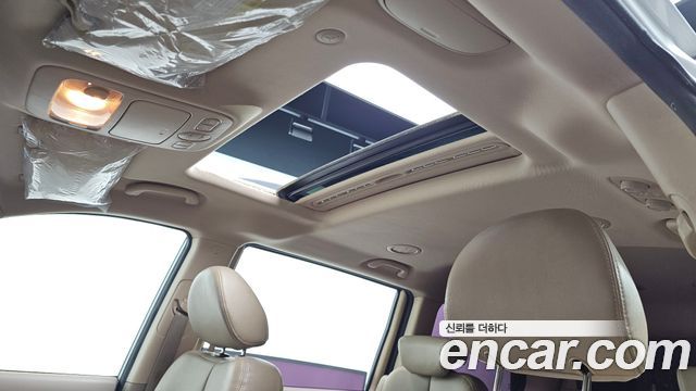 Kia Canival 2013 — photo 21