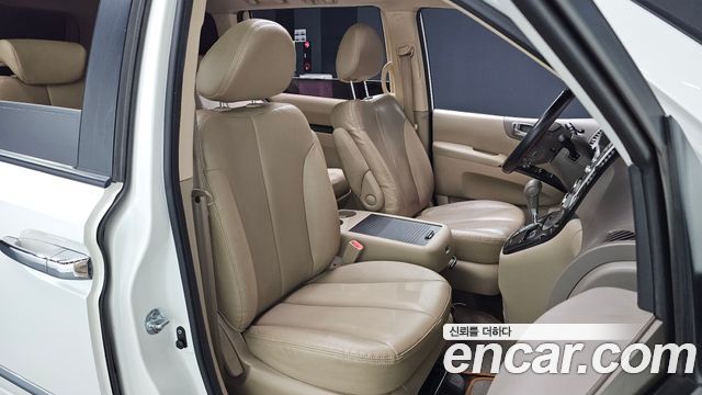 Kia Canival 2013 — photo 22