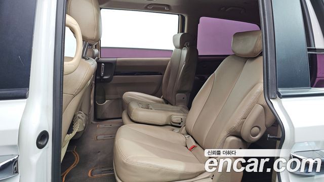 Kia Canival 2013 — photo 23