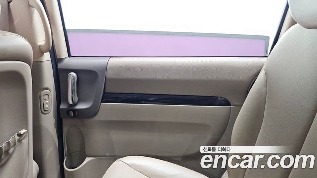 Kia Canival 2013 — photo 26