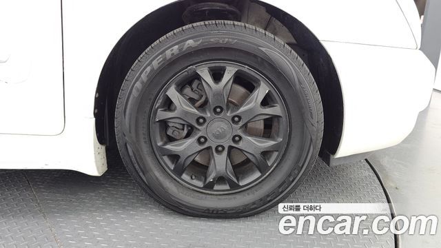 Kia Canival 2013 — photo 7