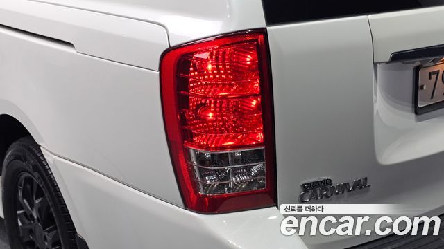 Kia Canival 2013 — photo 9
