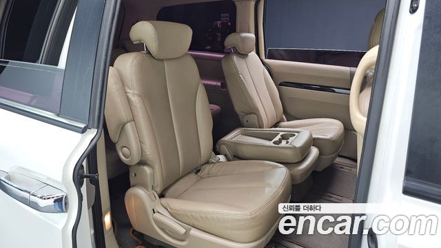 Kia Canival 2013 — photo 16