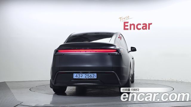 Tesla Model Y 2025 — photo 4