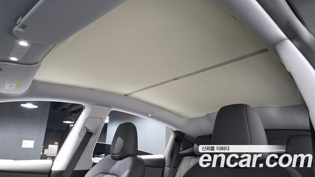 Tesla Model Y 2025 — photo 16