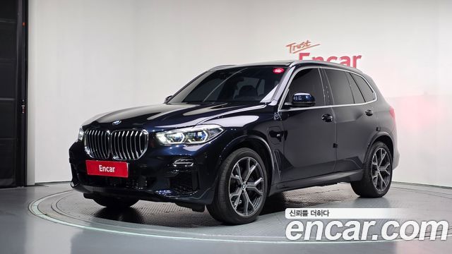 BMW X5 2021 — photo 1