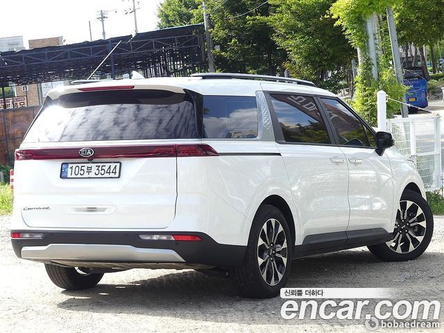 Kia Canival 2021 — photo 2
