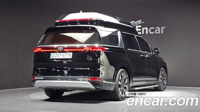 Kia Canival 2021 — photo 2