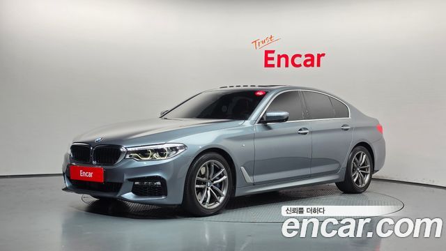 BMW 5-Series 2018 — photo 1