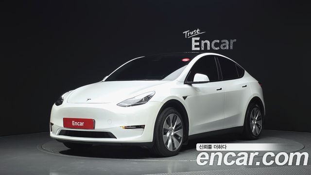 Tesla Model Y 2021 — photo 1