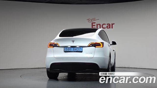 Tesla Model Y 2024 — photo 4
