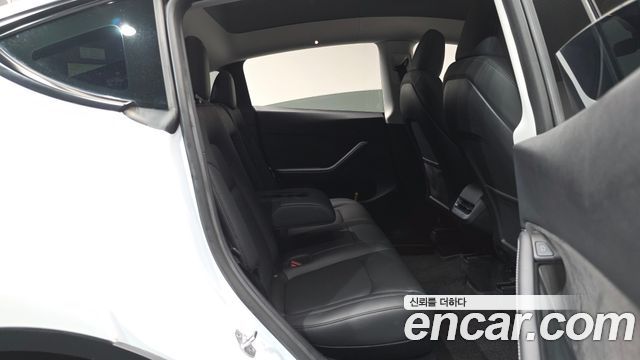 Tesla Model Y 2024 — photo 11