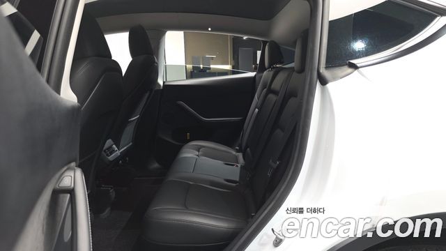 Tesla Model Y 2024 — photo 12
