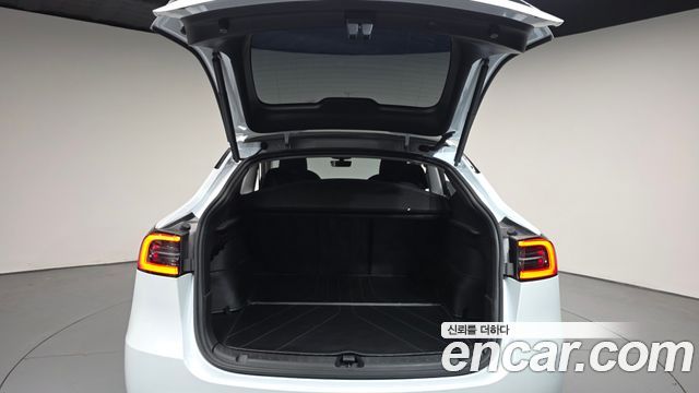 Tesla Model Y 2024 — photo 20