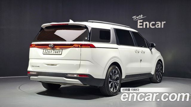 Kia Canival 2021 — photo 2