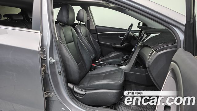 Hyundai i30 2014 — photo 11