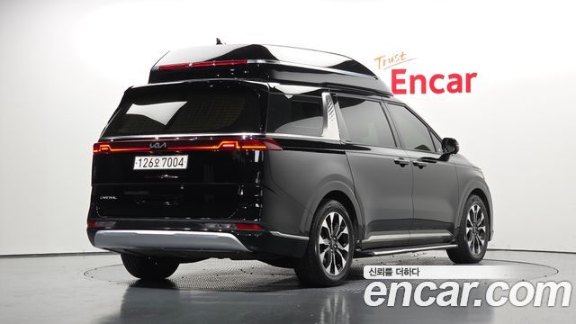 Kia Canival 2023 — photo 2