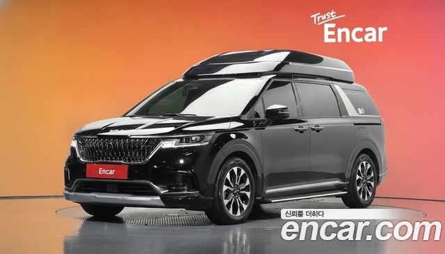 Kia Canival 2023 — photo 1