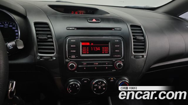 Kia K3 2015 — photo 14