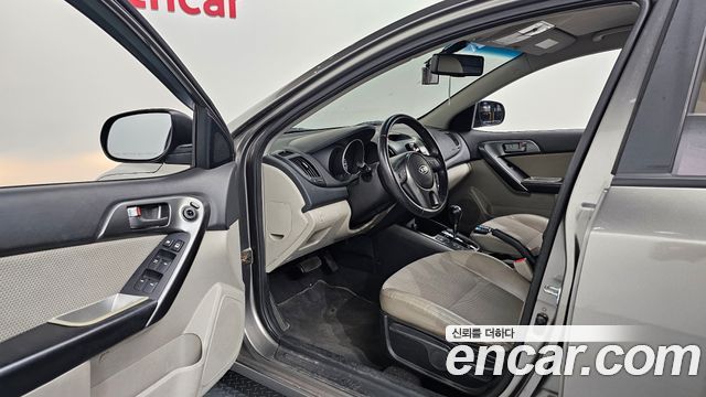 Kia Porte 2010 — photo 10