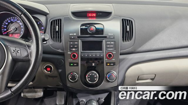 Kia Porte 2010 — photo 14